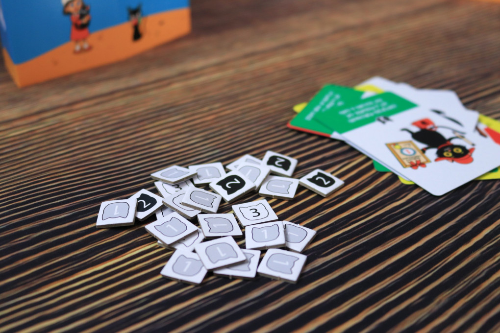 Gattara cat tokens in three colors and values