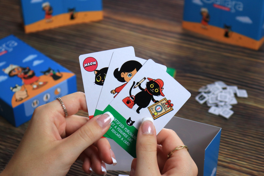 Gattara cards in a players hand